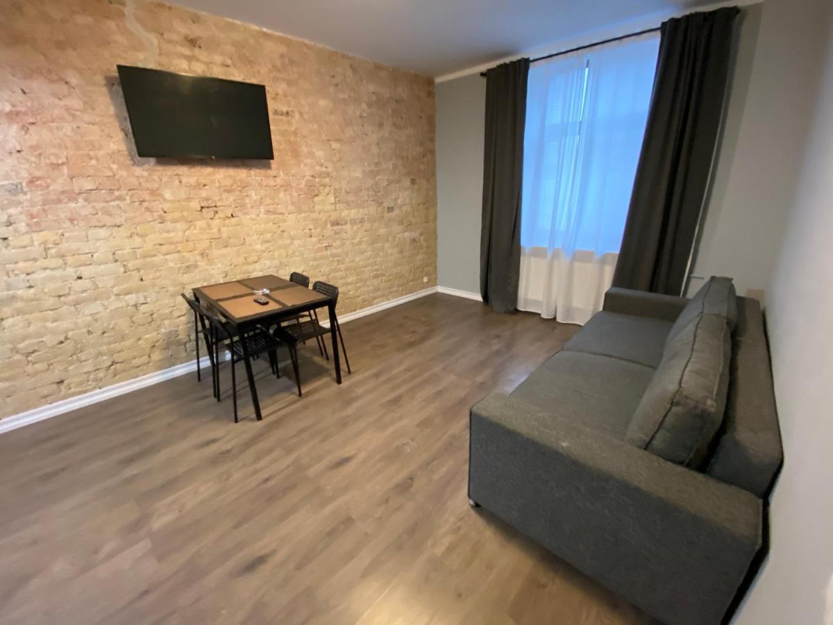 Aparthotel รีกา ภายนอก รูปภาพ A living room in a typical apartment
