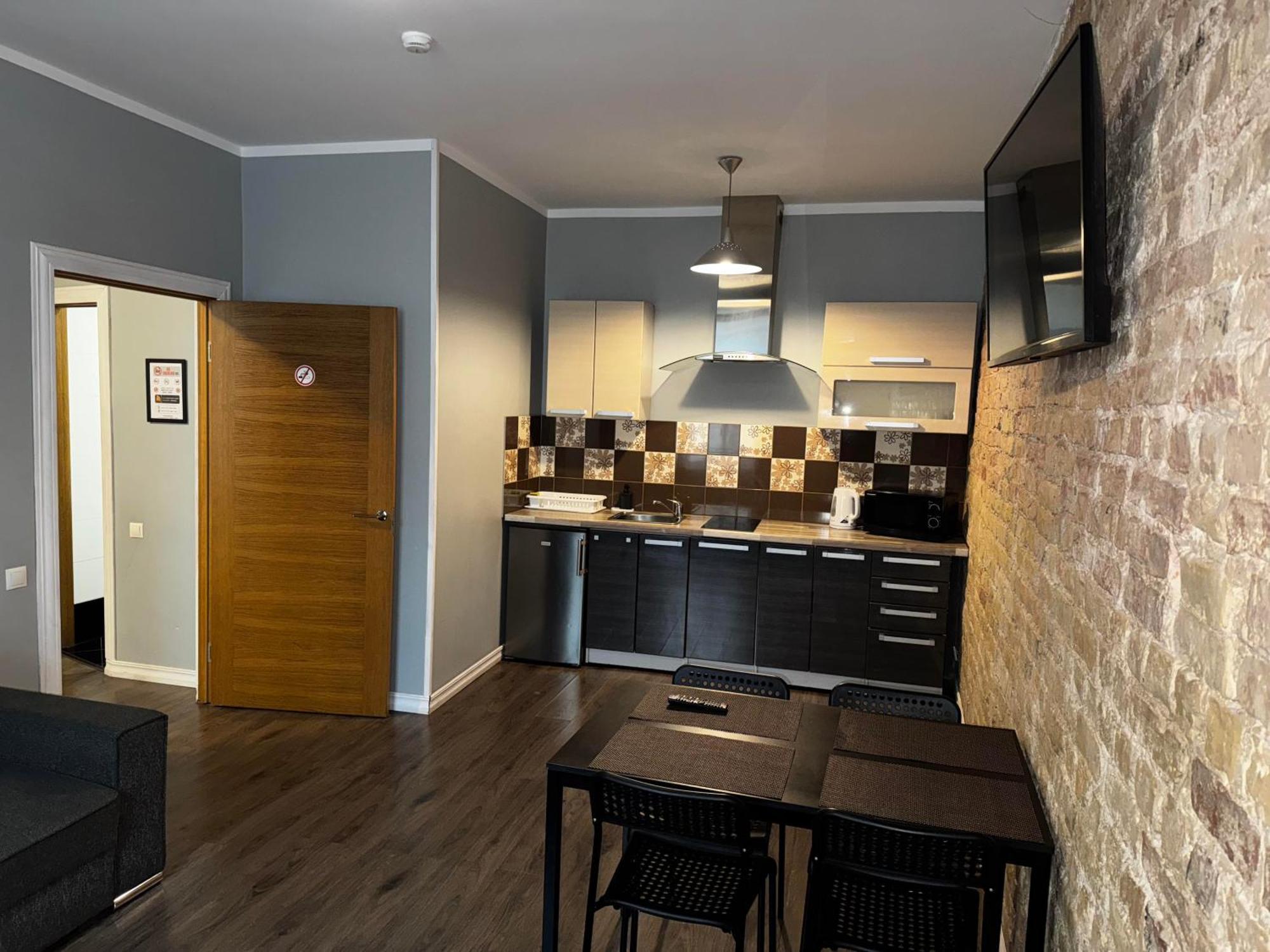 Aparthotel รีกา ภายนอก รูปภาพ A typical apartment at the University of Applied Sciences and Medical University of Southern Tyrol