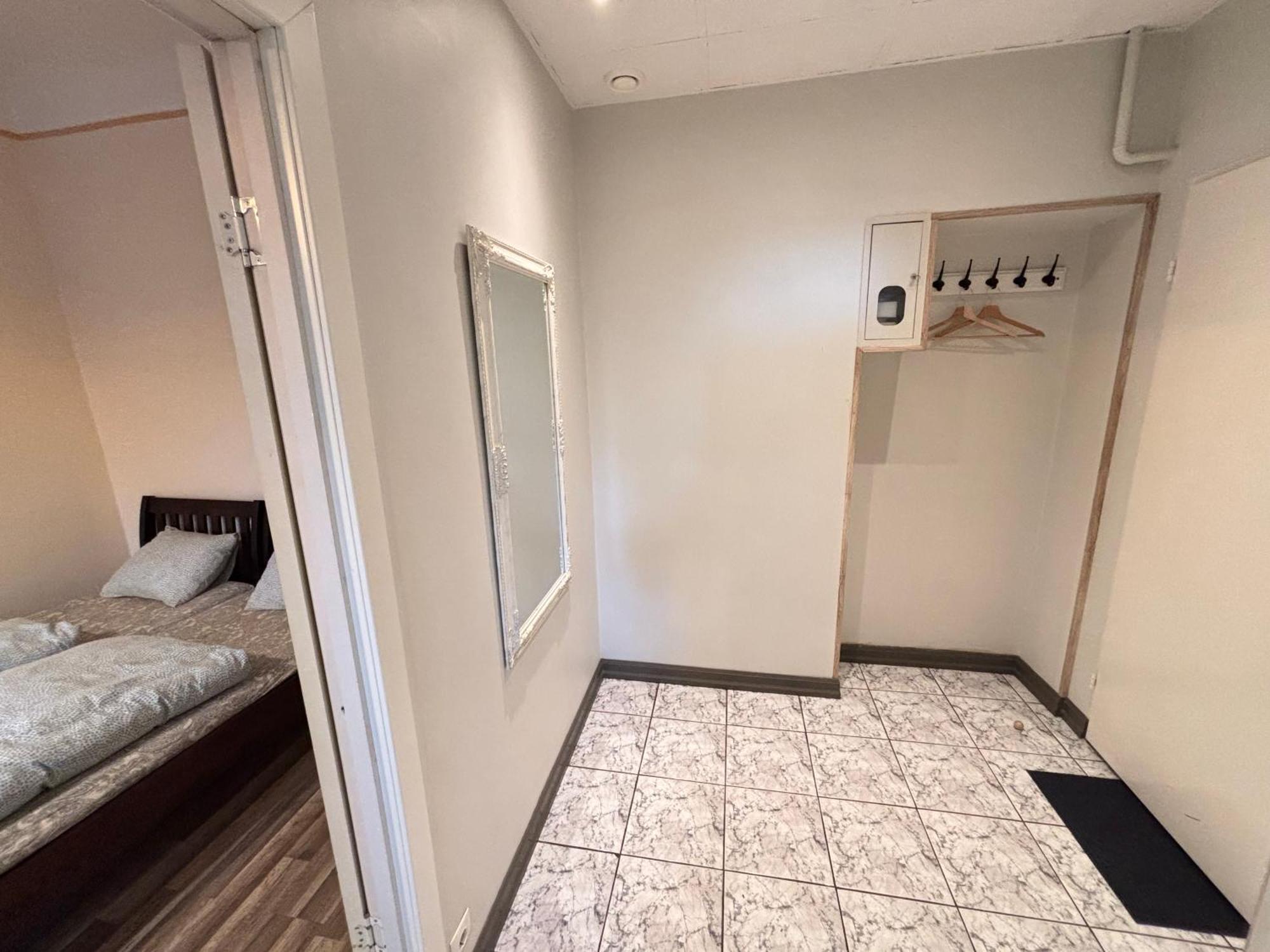 Aparthotel รีกา ภายนอก รูปภาพ A typical room at the hostel