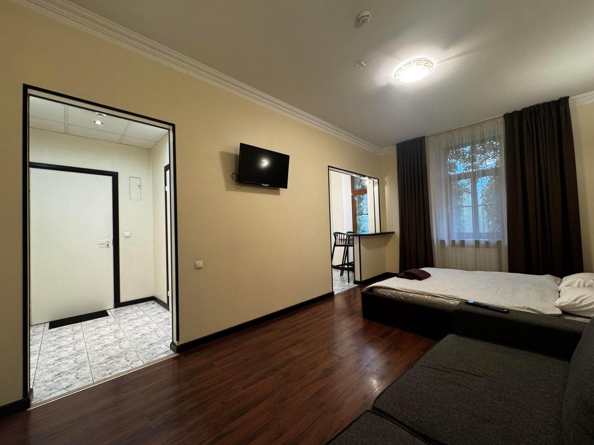 Aparthotel รีกา ภายนอก รูปภาพ A room at the hotel