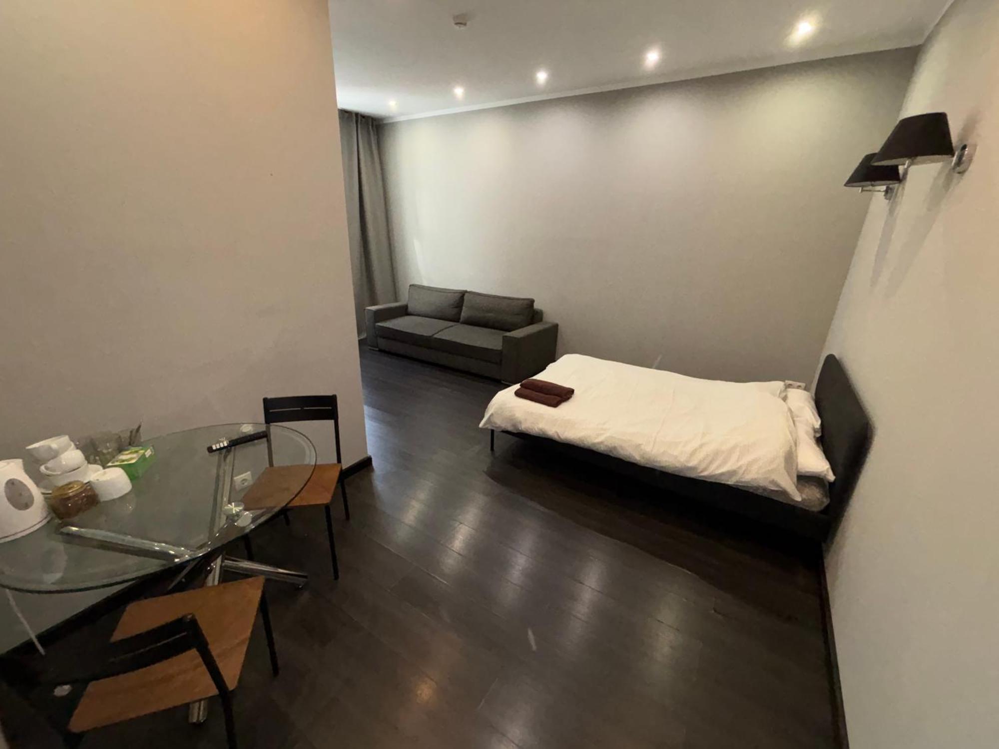 Aparthotel รีกา ภายนอก รูปภาพ A room at the hotel